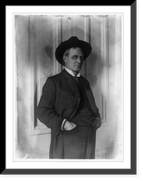 Historic Framed Print, [Champ Clark, half-length portrait, standing, facing right, hands in pants pockets],  17-7/8" x 21-7/8"