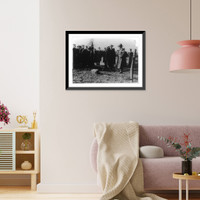 Historic Framed Print, A Lesson in camouflage which perplexed President Wilson on the occasion of a recent visit among the military. The President is being informed that a man is concealed within ten feet of him ...,  17-7/8" x 21-7/8"