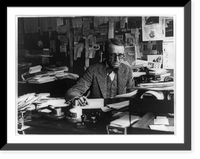 Historic Framed Print, [Man at desk reading typewritten pages],  17-7/8" x 21-7/8"