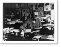 Historic Framed Print, [Man at desk reading typewritten pages],  17-7/8" x 21-7/8"