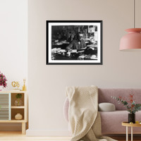 Historic Framed Print, [Man at desk reading typewritten pages],  17-7/8" x 21-7/8"