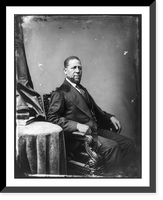Hiram Rhoades Revels, Afro-American senator, three-quarter length portrait, seated by small table, facing right, Historic Reproduction