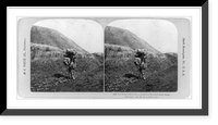 Historic Framed Print, The dwarf with his heavy load on a mountain road, Japan,  17-7/8" x 21-7/8"