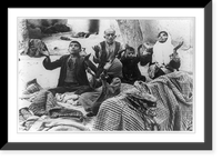 Earthquake victims in Tehran, Iran, praying to Allah for protection as they camp with their belongings in the open air northwest of Tehran Classic, Antique Wall Art