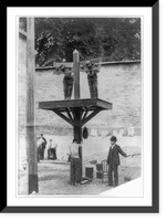 Historic Framed Print, [Two prisoners in pillory with another tied to whipping post below and man with whip in prison in Delaware],  17-7/8" x 21-7/8"
