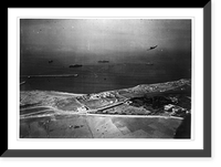 Safi, French Morocco. American transports and landing barges complete operations under the watchful eyes of Navy carrier-based planes. An SBD, Douglas Scout Bomber can be seen upper right. Classic