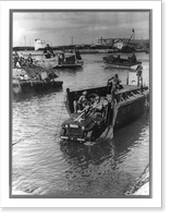 Jeep rolling off a landing boat at Fedala harbor during the landing operations of the U.S. task forces there, Fedala, Morocco, Vintage Print