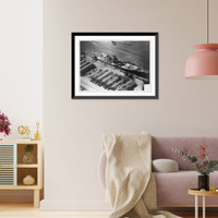 View of damage to the unfinished French battleship, Jean Bart, and sheds and pier damaged as the result of bombing and shell fire from U.S. fleet, Casablanca, French Morocco Vintage Wall Art Prin