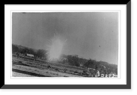 Historic Framed Print, [German airplane exploding over open field after being shot down by American plane, World War II],  17-7/8" x 21-7/8"