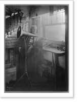 Historic Framed Print, [Thomas Alva Edison, full-length portrait, standing, facing right, listening to a new record],  17-7/8" x 21-7/8"