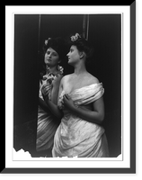 Historic Framed Print, [Young women modeling: Half lgth., looking in mirror and holding rose],  17-7/8" x 21-7/8"