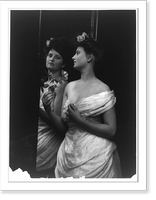 Historic Framed Print, [Young women modeling: Half lgth., looking in mirror and holding rose],  17-7/8" x 21-7/8"
