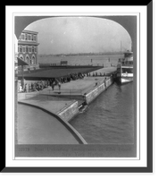 Historic Framed Print, Boat unloading immigrants at Ellis Island, New York harbor,  17-7/8" x 21-7/8"