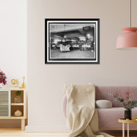 Historic Framed Print, [Parcel post area of mail room showing trucks and tables stacked with packages, U.S. Post Office, Washington, D.C.].National Photo Co., Washington, D.C.,  17-7/8" x 21-7/8"