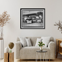 Historic Framed Print, [Parcel post area of mail room showing trucks and tables stacked with packages, U.S. Post Office, Washington, D.C.].National Photo Co., Washington, D.C.,  17-7/8" x 21-7/8"