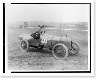 Historic Framed Print, [Side view of man and woman in Stutz Weightman Special no. 26 on Benning race track, Washington, D.C., area],  17-7/8" x 21-7/8"