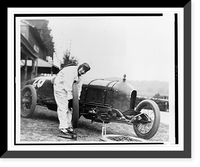 Historic Framed Print, [Woman changing tire of Stutz Weightman Special no. 26 on Benning race track, Washington, D.C., area],  17-7/8" x 21-7/8"