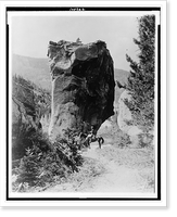 Historic Framed Print, [Man on horseback by butte in Rocky Mountain National Park, Colorado],  17-7/8" x 21-7/8"