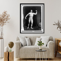 Historic Framed Print, [Strongman posed with muscles flexed],  17-7/8" x 21-7/8"