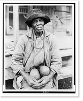 Uncle gets some citrus fruit to pep up his appetite, Cleveland, Miss, Antique Wall Art