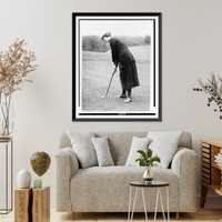 Miss Elsie Patterson, full-length portrait, standing, facing left, ready to hit golf ball, Washington, D.C., area(?) Classic, Historic Print