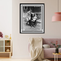 Charles Evans Hughes, seated, full-length, holding his grandson, with Charles Evans Hughes, Jr. seated on arm of the same chair - 2, Vintage Print