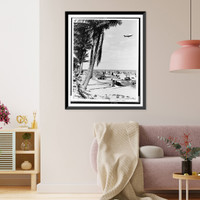 Beach scene with palm trees in foreground and Goodyear blimp above.photo by G.W. Romer, Miami, Fla, Vintage Print