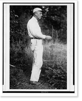 Aldo Leopold examining tamarack, presumably at his Sauk County, Wisconsin retreat Classic, Antique Poster
