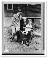 Charles Evans Hughes, seated, full-length, holding his grandson, with Charles Evans Hughes, Jr. seated on arm of the same chair - 3, Historic Reproduction