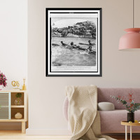Nubian boys shooting the rapids of the Nile on logs, Egypt, Antique Print