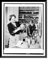 Mrs. Earl Warren, wife of the Governor. of California labels her stock of preserves, aided by her youngest son, Robert, 9 Classic, Antique Poster