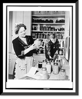 Mrs. Earl Warren, wife of the Governor. of California labels her stock of preserves, aided by her youngest son, Robert, 9 Classic, Antique Poster