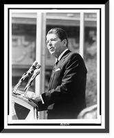 Ronald Reagan, half-length portrait, standing at microphones, facing left.photography by Marcia Dente, Antique Print