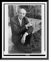 Aaron Copland, full-length portrait, seated, outdoors, facing front.Margery Smith, Vintage Poster