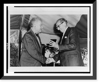 Edgard Varese shaking hands with Aaron Copland, with Mr. Copland receiving presentation, standing, half-length.Bernice B. Perry, Wilton, New Hampshire, Historic Print