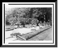 A Shaded gravelled terrace, screened by orange trees, with chaise lounges, settees and tables, at Pavilion Colombe, Mrs. Edith Wharton's villa, St. Brice-sous-For&ecirc;t, France Antique Wall Art