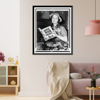 Margaret Mitchell, half-length portrait, seated, facing slightly right, holding her book, Gone with the wind.World-Telegram photo by William F. Warnecke, Historic Print