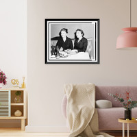 Historic Framed Print, [Mrs. Adam Bernabeo and Mrs. Randolph Guggenheimer, seated at table, with food and beverages],  17-7/8" x 21-7/8"