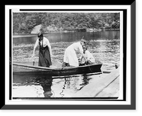 Historic Framed Print, [Three Girl Scouts in boat at a camp],  17-7/8" x 21-7/8"