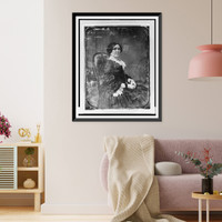 Unidentified woman, about 40 years of age, three-quarter length portrait, body to right, facing front, seated in upholstered chair, hands in lap, Antique Print
