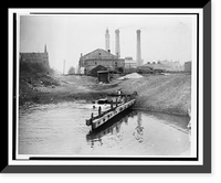Two men swimming behind the Chicago water tower and pumping station, Historic Reproduction
