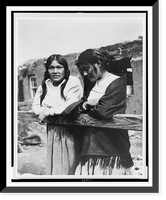 Two unidentified Indian women standing, in front of adobe building Classic, Antique Wall Art