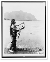 Native woman, standing at edge of water, holding lei, Antique Print