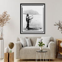 Native woman, standing at edge of water, holding lei, Antique Print