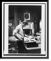Attorney Gen. Robert F. Kennedy, three-quarter length portrait, standing at desk, facing right, reading paper on desk.Henri Cartier-Bresson, Magnum Photos, Inc., New York, N.Y. Vintage Wall Art P
