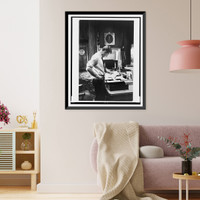 Attorney Gen. Robert F. Kennedy, three-quarter length portrait, standing at desk, facing right, reading paper on desk.Henri Cartier-Bresson, Magnum Photos, Inc., New York, N.Y. Vintage Wall Art P