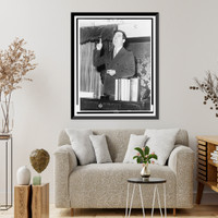 Historic Framed Print, [Huey P. Long, half-length portrait, standing, facing left, gesturing with right arm, as he speaks],  17-7/8" x 21-7/8"