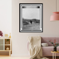 Historic Framed Print, [Pima woman, with burden basket on back, walking away from camera, Pima, Arizona],  17-7/8" x 21-7/8"