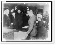 Man in office administering oath to three other men, Vintage Print