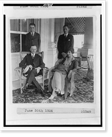 Historic Framed Print, [President and Mrs. Coolidge, full-length portraits, seated on porch, with their two sons standing behind them],  17-7/8" x 21-7/8"